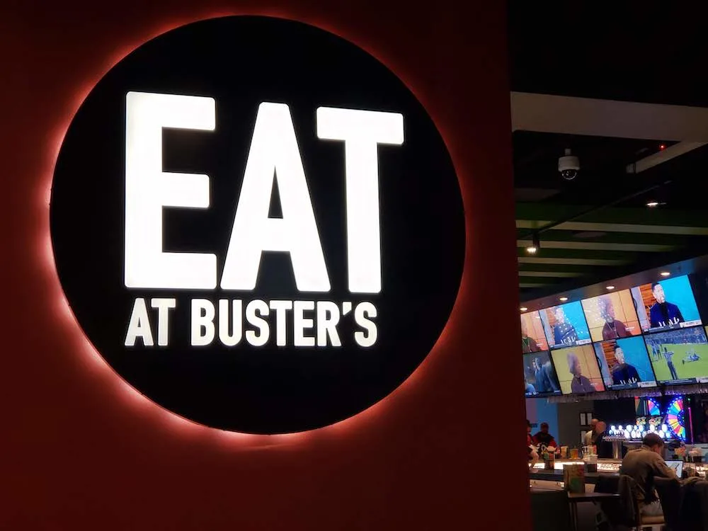 eat some delicious food at Dave and Buster's