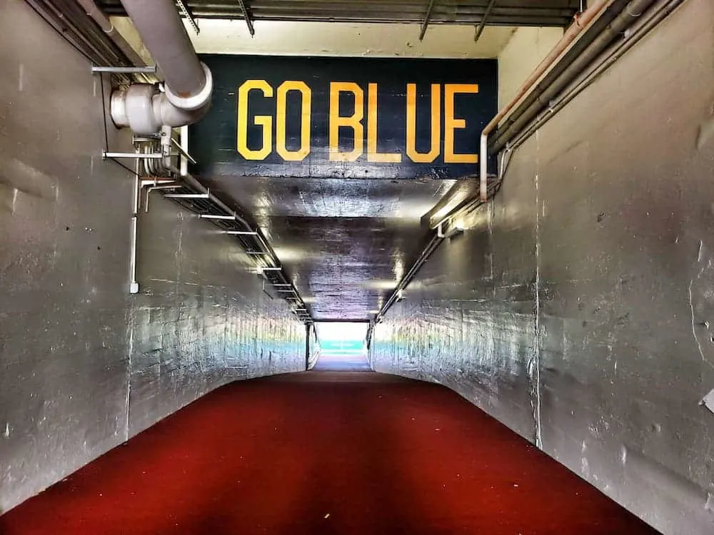 The tunnel leading out to the field from the locker room at the iconic Michigan Stadium. - Family Vacations U.S. 