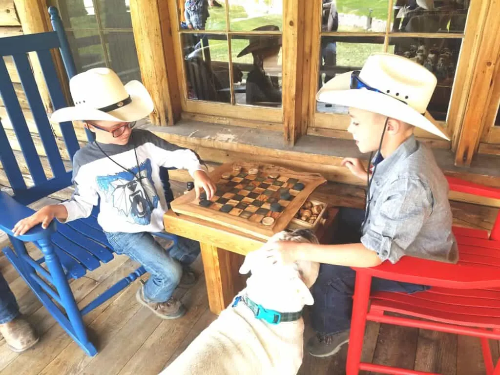 Playing games on the front porch of Rawah Guest Ranch